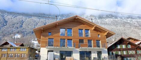 Cloud, Sky, Building, Property, Window, Mountain, House, Architecture, Neighbourhood, Urban Design