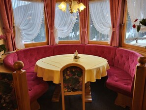 Furniture, Table, Property, Window, Curtain, Decoration, Chair, Tablecloth, Textile, Architecture