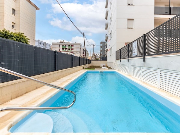 Water, Building, Cloud, Sky, Window, Swimming Pool, Line, Composite Material, Leisure, Real Estate