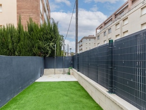 Daytime, Sky, Window, Plant, Building, Cloud, Urban Design, Grass, Condominium, Fence