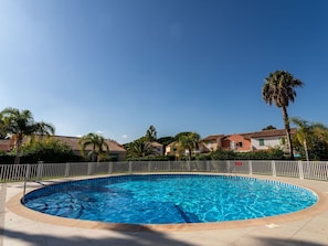 Water, Sky, Plant, Property, Swimming Pool, Blue, Tree, Azure, Arecales, Leisure