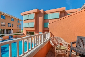 Balcony overlooking the pool and Gulf