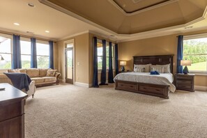 The Master Bedroom is quite massive with a large sitting area and a sleeper sofa.