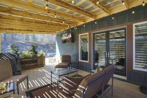 Dream Patio with Outdoor Smart TV, Gate to Backyard