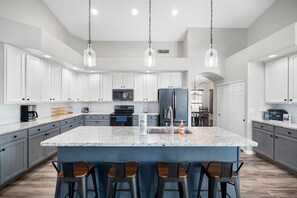 Huge Kitchen Island with huge island and seating for four.