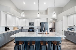 Huge Kitchen Island with huge island and seating for four.