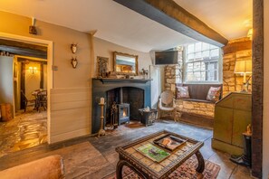 Cosy lounge area and log burner