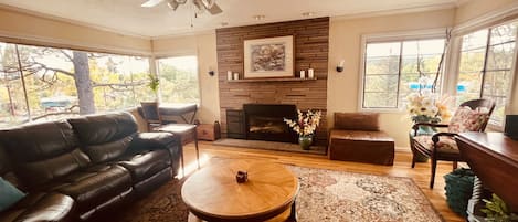 Cozy living room with gas fireplace and large screen tv