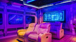Theater Room with galaxy aerospace theme, 85" Large smart TV.
