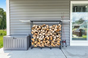 Firewood provided by us! Along with 2 fishing poles and deck box filled with life jackets for different ages, lawn games and beach toys!