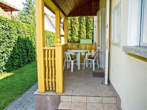 Plant, Building, Chair, Wood, Interior Design, Shade, Porch, Grass, Tree, Real Estate