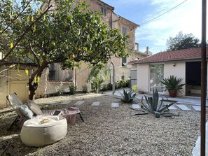 Sky, Cloud, Furniture, Property, Plant, Shade, Chair, Flowerpot, Table, Architecture