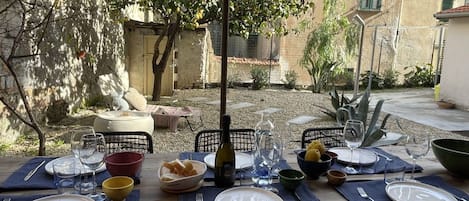 Sky, Cloud, Furniture, Property, Plant, Shade, Chair, Flowerpot, Table, Architecture