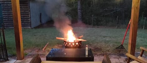 Enjoy a few drinks on the back lawn around a cozy fire