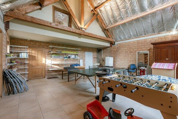 Attic with pingpong table, football table and other games