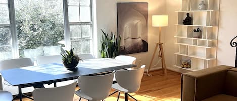 Living/dining area furnished with BoConcept furniture.