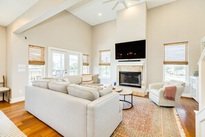 Bright and airy living area with vaulted ceilings