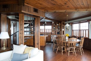 The dining room boasts a huge 8 person table perfect for huge feasts.