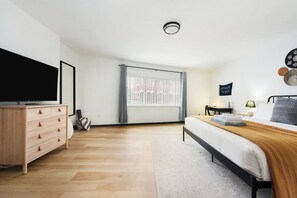 King-sized bedroom - perfect for a restful night's sleep.