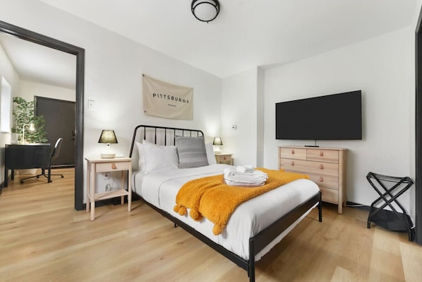 Relax in this cozy bedroom, complete with a comfy queen bed.