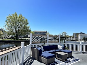 Our large back deck surrounded by water views