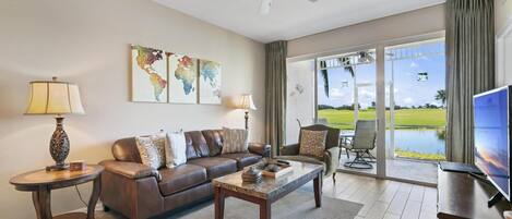 Livingroom looking out over the linai and pond.