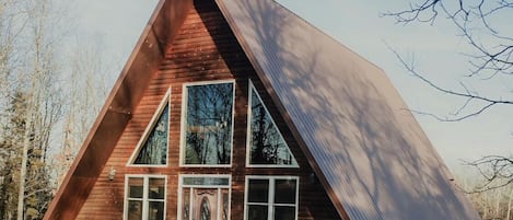 Angled view of the front and side of the house