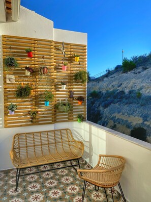 Private balcony off the master and second bedroom.  Enjoy the living garden wall