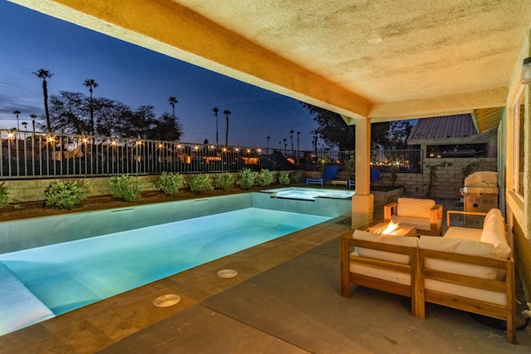 The backyard lights up great at night so you can enjoy the pool after sunset!