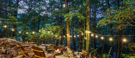 Enjoy the tranquility in the outdoor firepit area while creating memories.