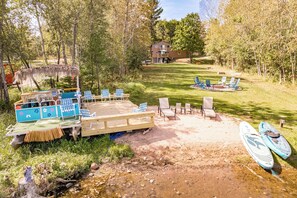 Our spacious backyard boasts a deck with breathtaking views of the lake