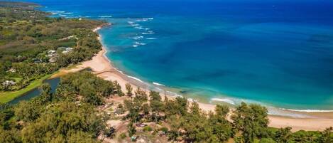 Areal view of Anahola house on beach.