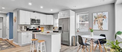 Cook up something special in this well-stocked kitchen! With everything you need from plates and bowls to pots and spices, you can be sure to make a delicious meal every time