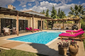 Private Swimming pool, gardens with shaded seating area