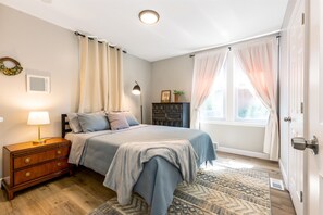 A cozy bedroom with everything you need for a good night's sleep.