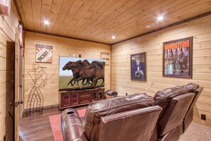 Catch a movie or watch the game in the theater just off the Man Cave