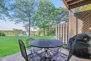 Patio with views of the harbor in the distance. Please note there is no longer a grill due to fire department regulations.