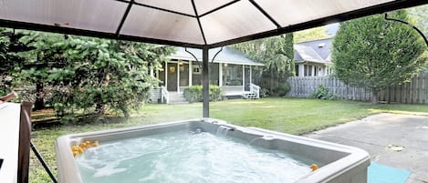 Sunsational hot tub in the backyard for your year round enjoyment