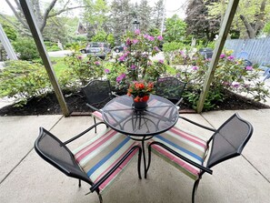 Patio area with a table and chairs