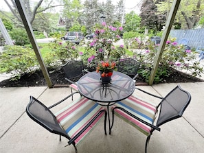 Patio area with a table and chairs