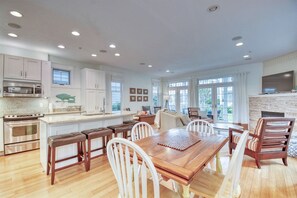 Aqua Essence open floor plan living dining kitchen