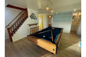 Enter game room through front door or side deck.  