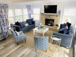 Living space with plenty of seating and a Smart TV