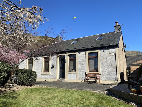 Enclosed south facing garden with spectacular views of Dumyat & Ochilhills. 