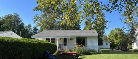 This cottage sits next to the main house.  All the grass you see is yours. 