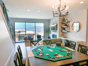 Enjoy a tournament or a cash game with a poker table top, chips, and cards