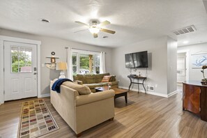 Spacious living room to cozy up when the weather isn't cooperating!