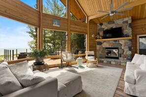 Main floor living room with lake views!