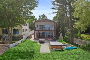 View from beach, corn hole boards, kayaks, and many more outdoor activities