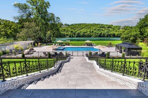 Stairway from the mansion to the pool overlooking the lake